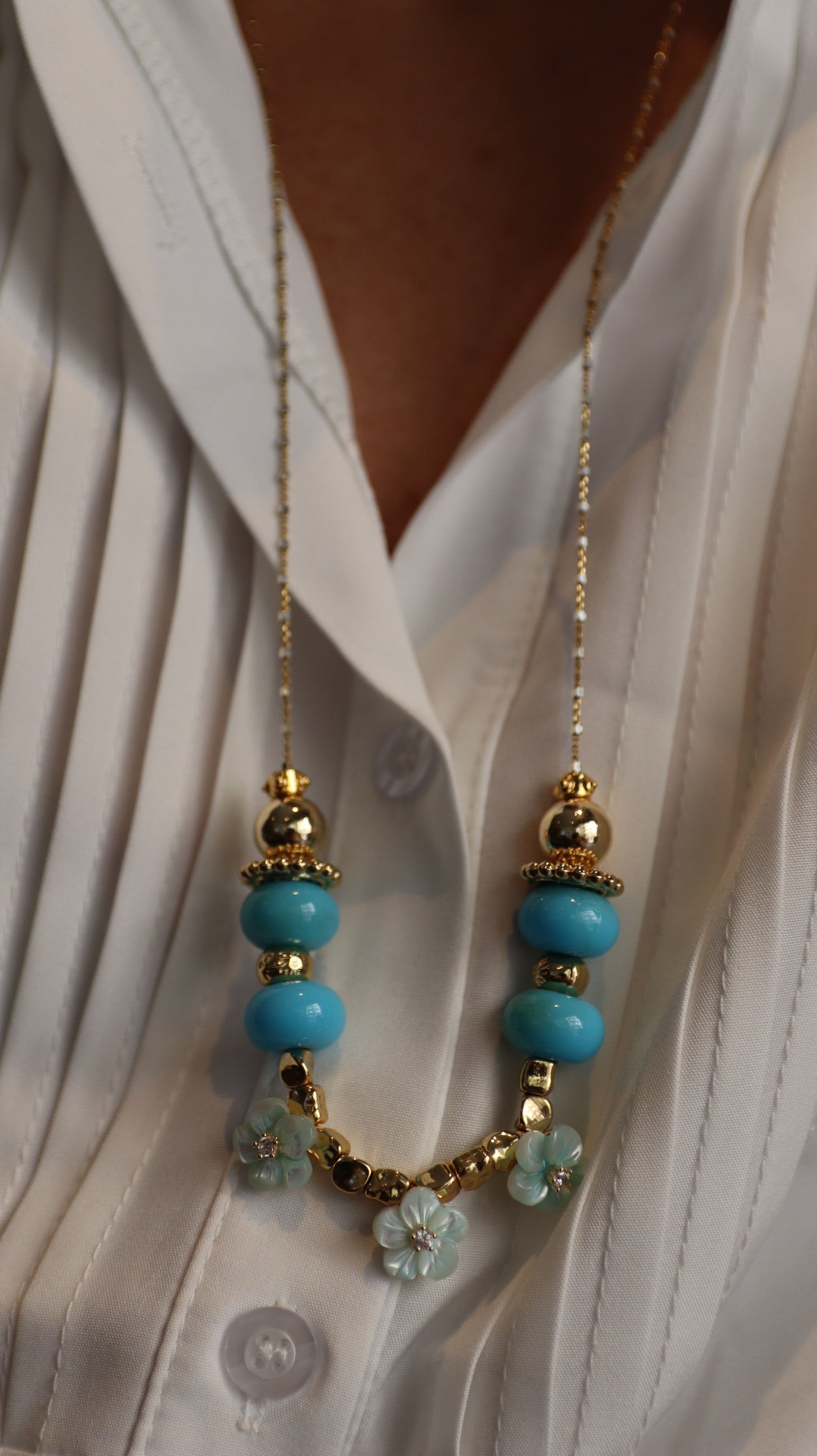 BLUE BLOSSOM LONG CHARMS NECKLACE WITH FLOWERS
