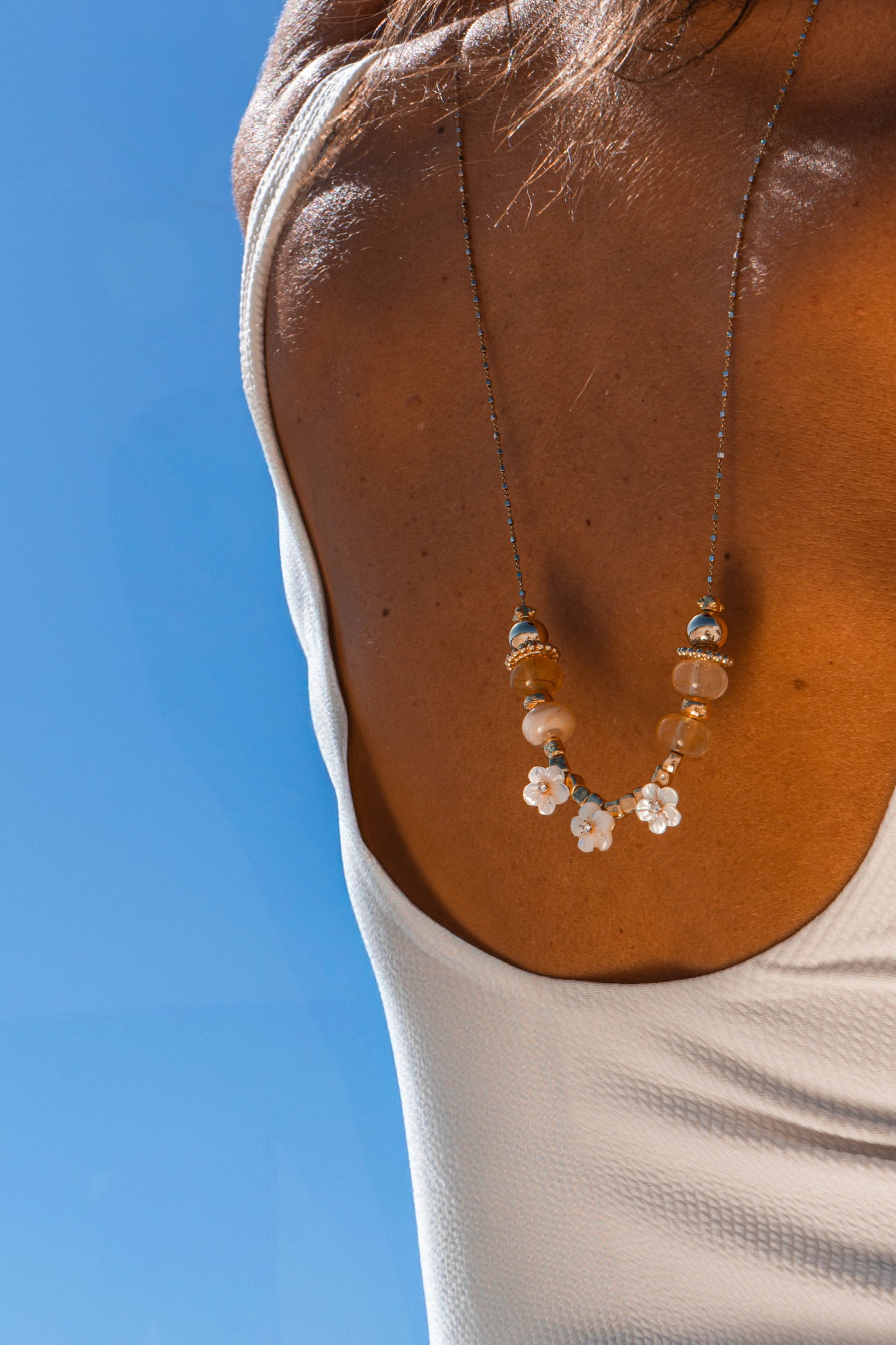IVORY BLOOM  LONG CHARMS NECKLACE WITH FLOWERS